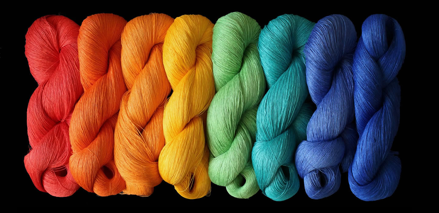 Rainbow-coloured yarn skeins